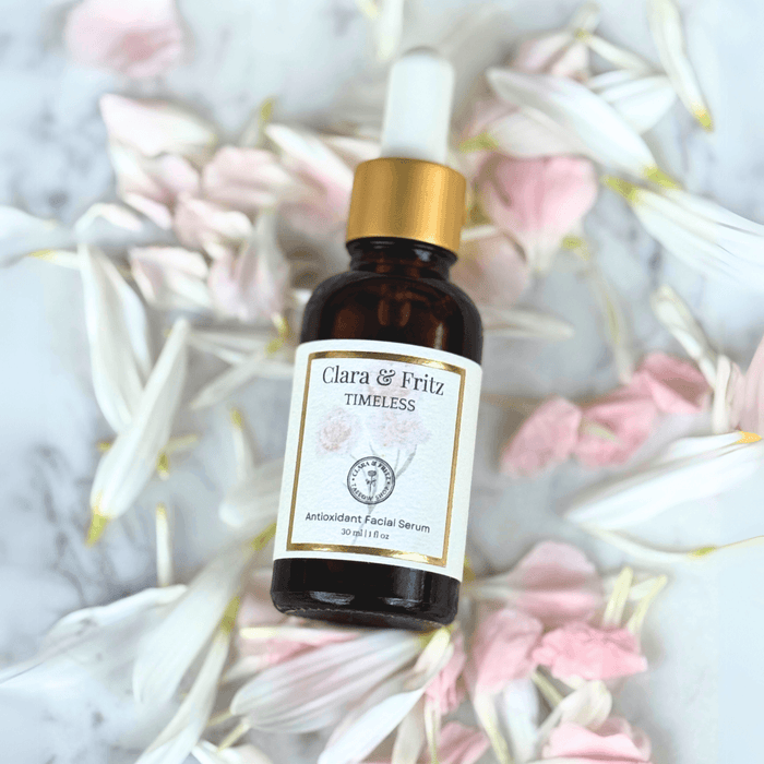 The Complete Facial Skincare Routine includes a Clara & Fritz antioxidant facial serum bottle with flowers.