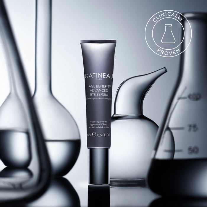 Age Benefit Advanced Eye Serum with beakers in background
