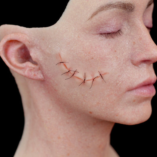Curve Sutured Wound (Large)