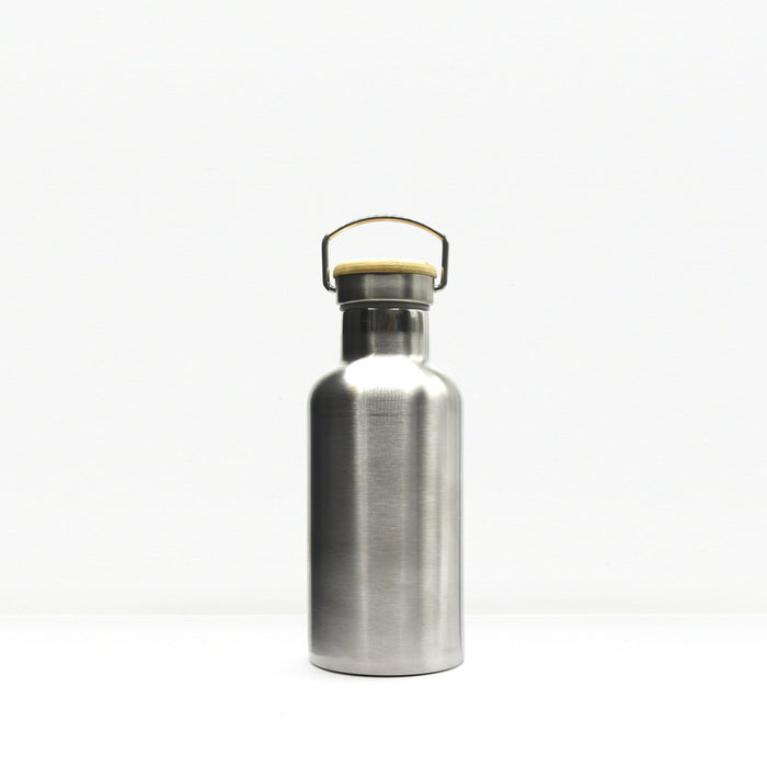 Close up of the insulated water bottle neck with a wooden cap and metal carrying handle.