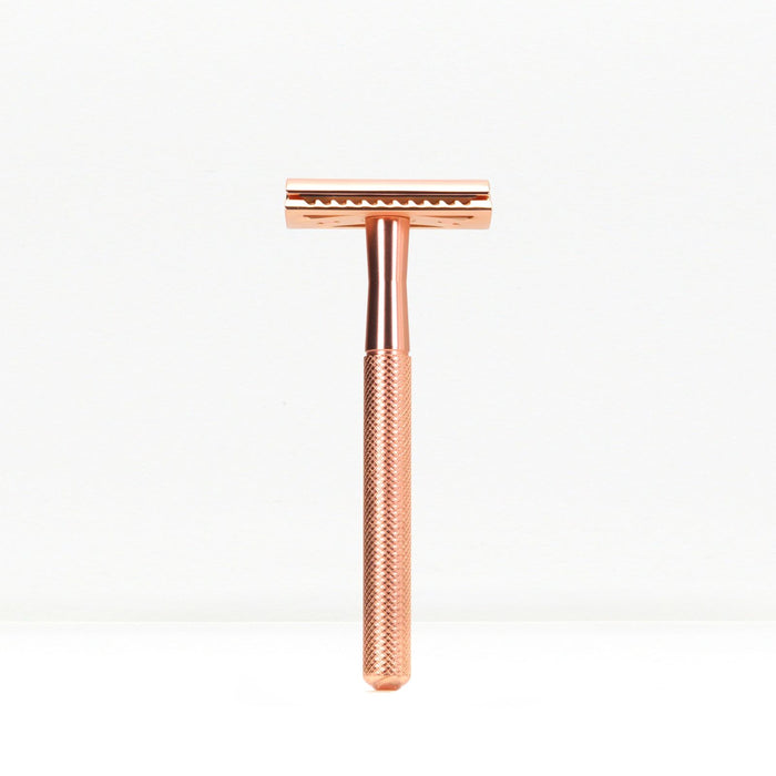 Bambaw Rose gold safety razor on a white background
