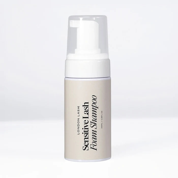 London Lash Sensitive Lash Foam Shampoo in a white foaming pump bottle with a clear cap, displayed upright on a white background.
