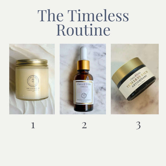 Image of The Timeless Routine skincare set including oil cleanser, facial serum, and antioxidant balm for nourishing skin.